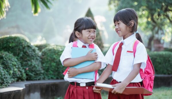 happy-student-friend-uniform-smiling-camera_8595-25677 happy-student-friend-uniform-smiling-camera_8595-25677
